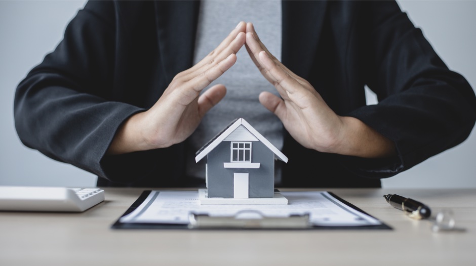 a hand over the roof Insurance value analysis​