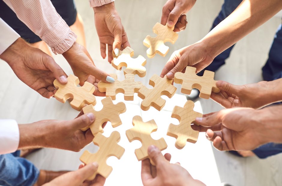 jigsaw pieces building teamwork business succession planning